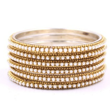 Beautiful and uniquely gold polished white stone bangle set