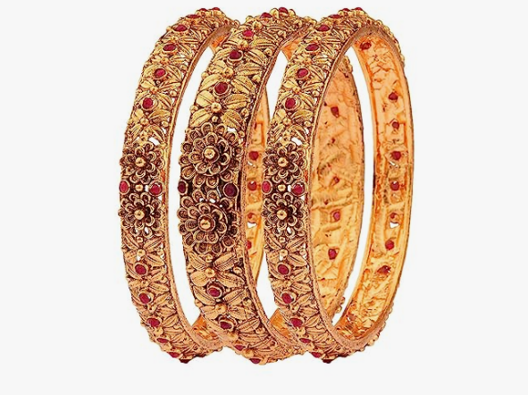 Beautiful gold polish copper bangles Ruby studded