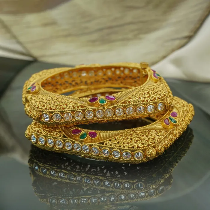 Beautiful uniquely designed gold plated copper bangles
