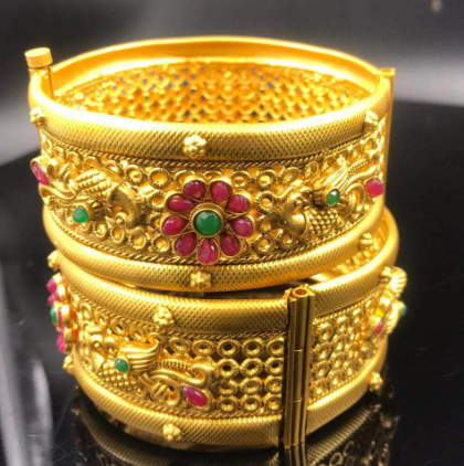 Beautiful gold plated stone studded bangle set woman