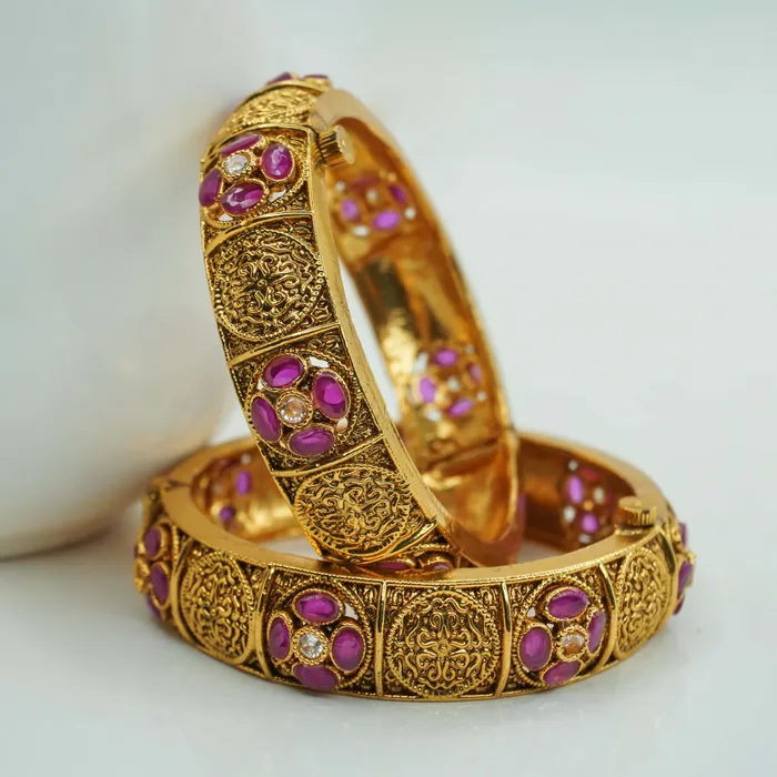 Beautiful gold polish copper bangles Ruby studded